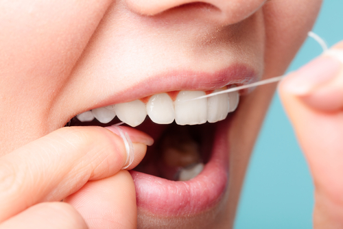 Dentist recommends flossing once a day